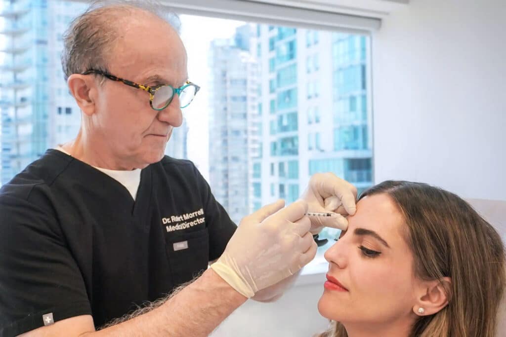 A doctor administering Botox to a patient, demonstrating what is botox?